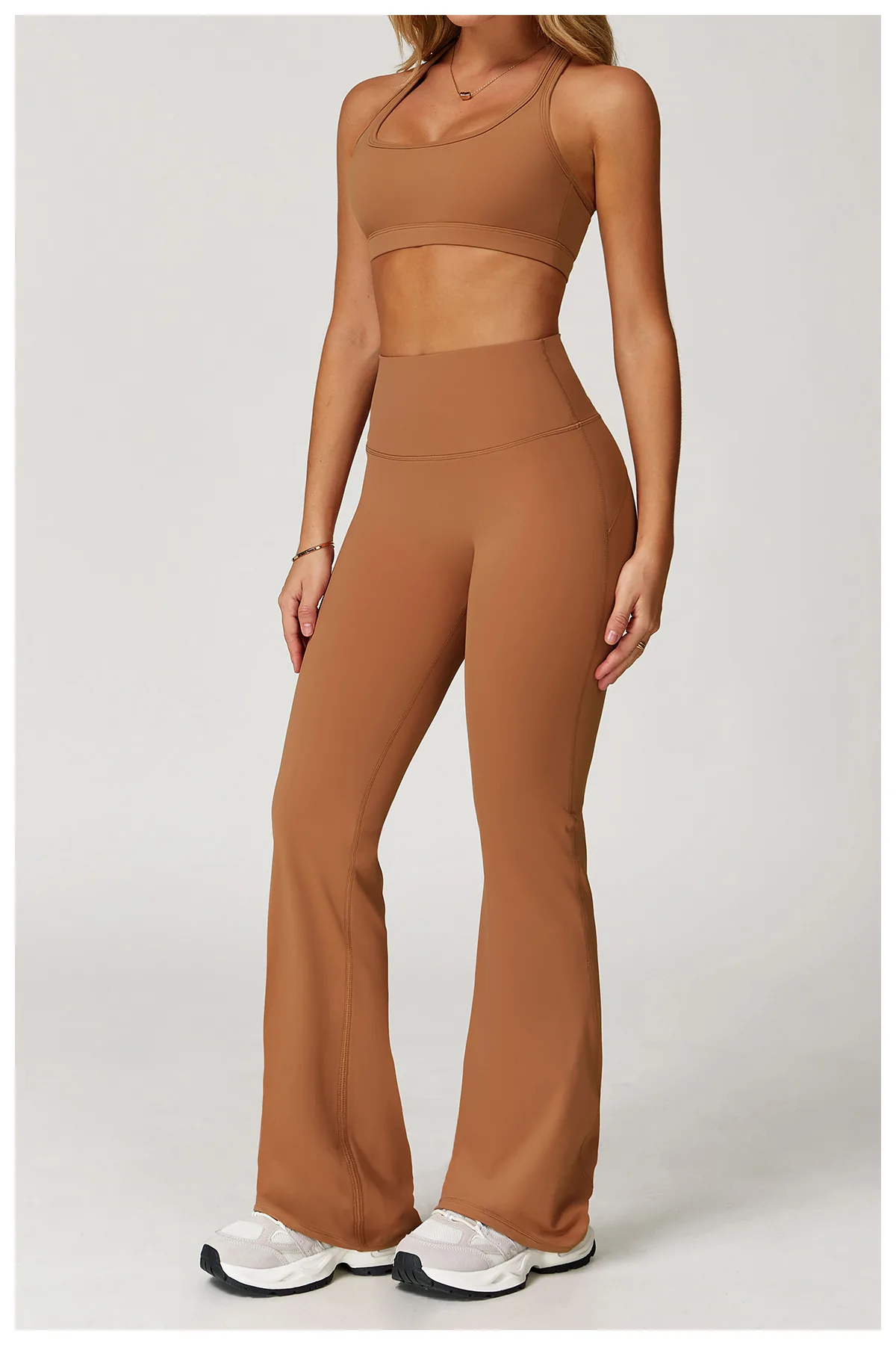 YEEGEM YGCK2020-1 high-waist flared pants in pumpkin orange, angled view