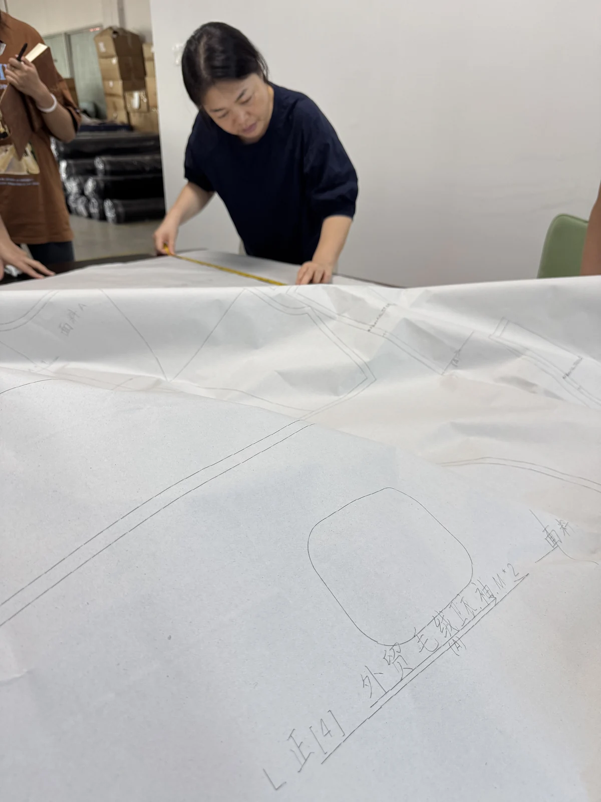 Reviewing a paper pattern during sample development.
